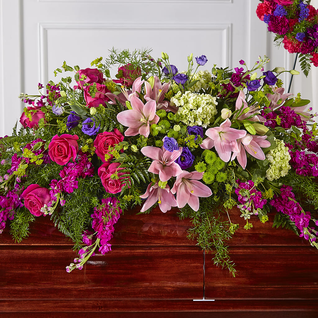 Radiant Tribute Casket Spray – The Flower Garden, Nettleton MS