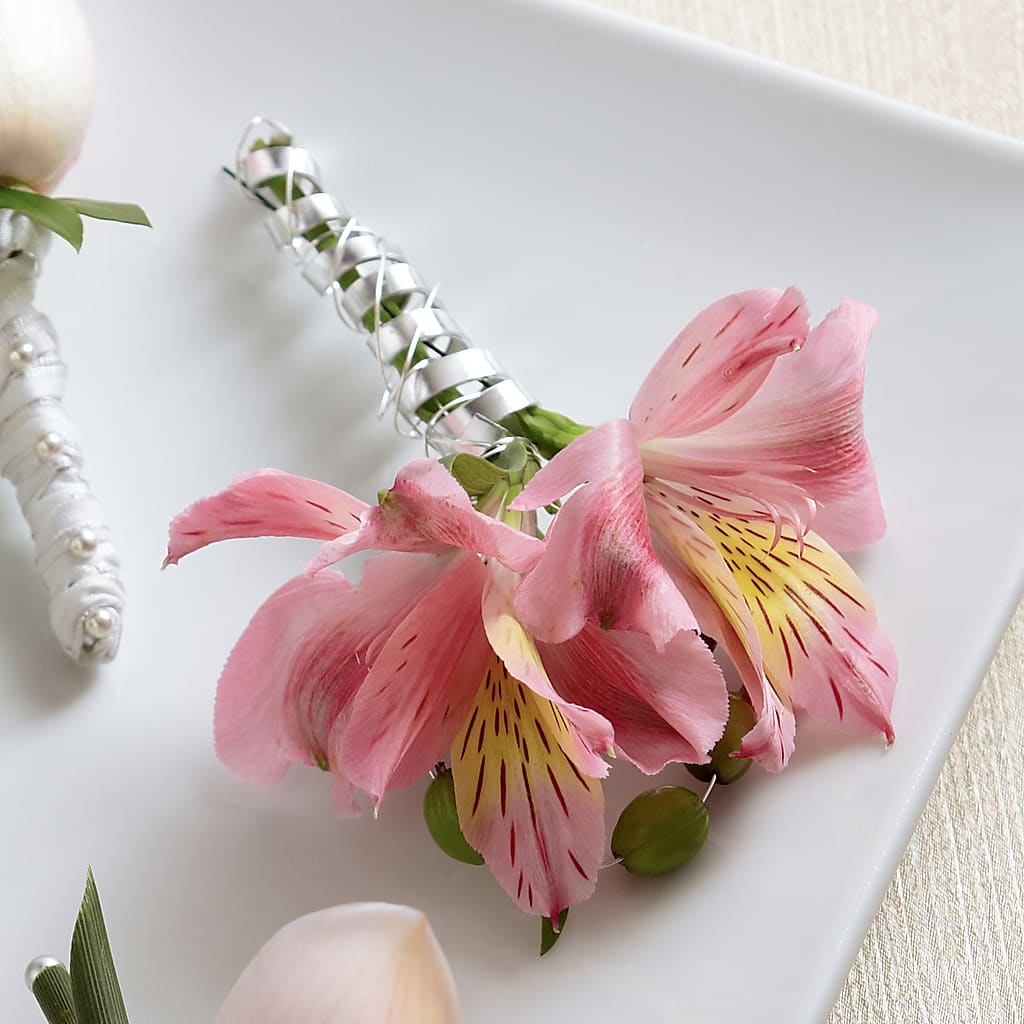 Pink Peruvian Lily Boutonniere – The Flower Garden, Nettleton MS