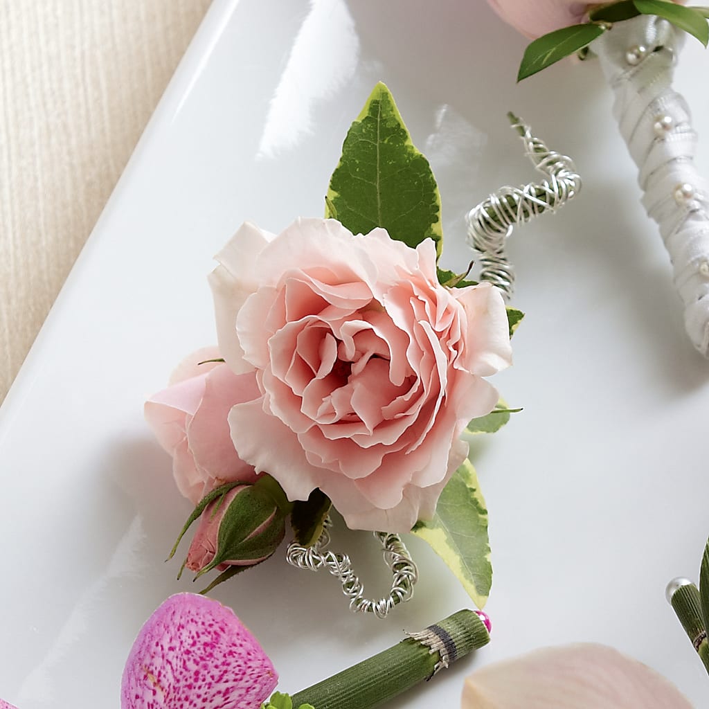 Pink Spray Rose Boutonniere – The Flower Garden, Nettleton MS