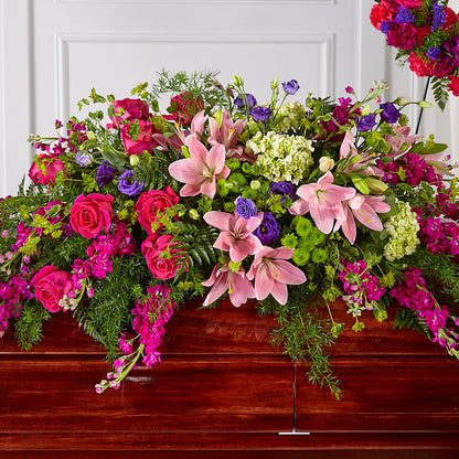 Radiant Tribute Casket Spray –  The Flower Garden, Nettleton MS
